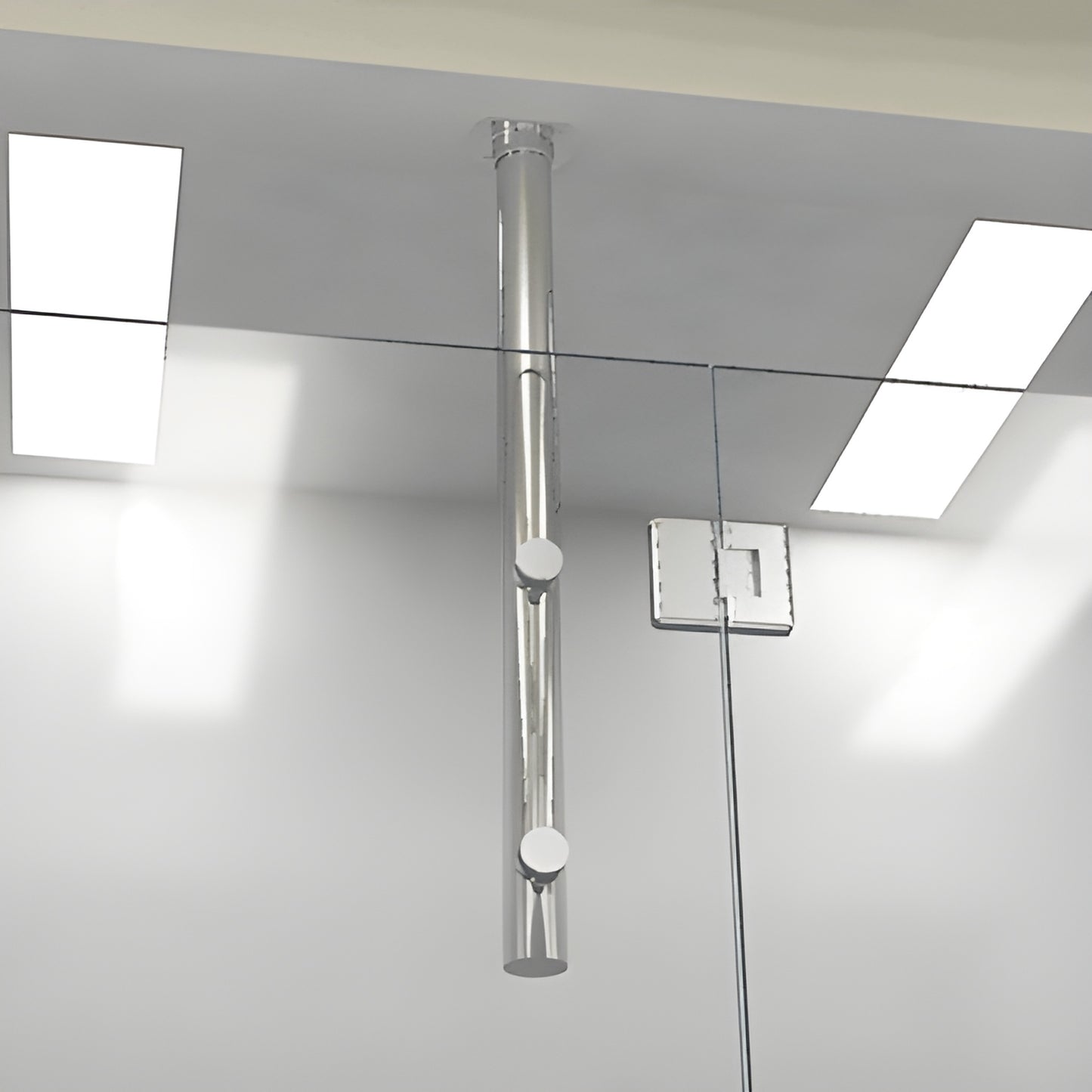 Polished chrome 33 in tubular ceiling-mounted vertical post with two round clamps supporting frameless shower glass (VPK33CH)