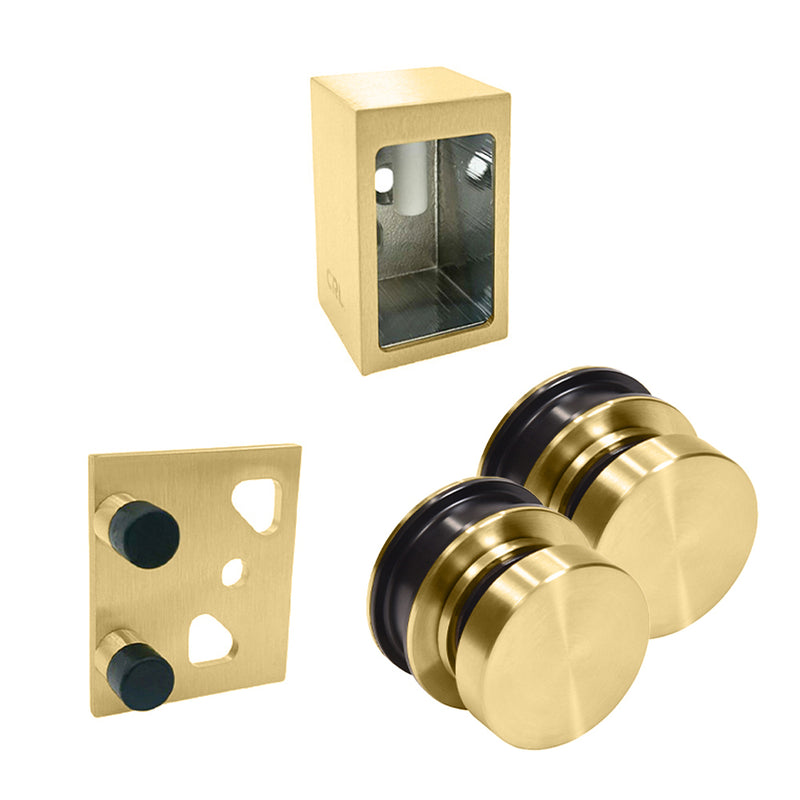 A set of satin brass Brixen shower door components including two rollers, a wall bracket, and a stopper.