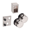 A set of brushed stainless steel Brixen sliding shower door components including two rollers, a wall bracket, and a stopper.