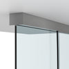 A close-up view of the brushed stainless anodized track mounted to a ceiling above glass panels.