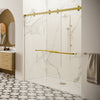 A modern bathroom features a CRL Cambridge Series two-door bypass sliding shower system with a satin brass finish installed in a marble-tiled enclosure.