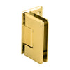 A polished brass Cologne 044 series wall mount offset hinge shown from an angled perspective.