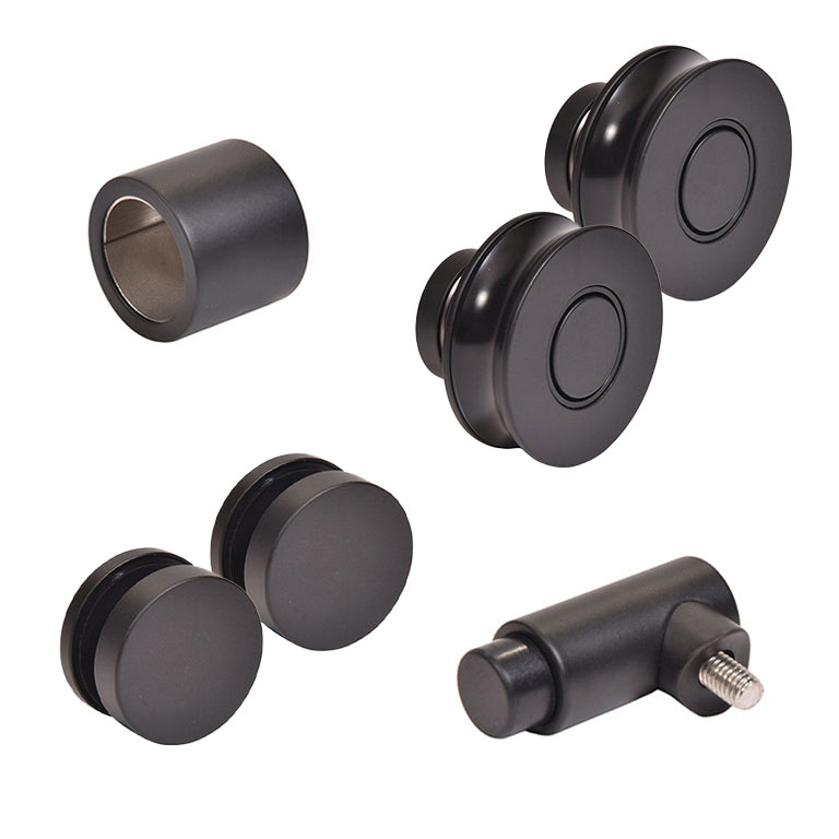 A collection of matte black stainless steel hardware components for a Colonia sliding shower door system.