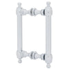 A pair of polished chrome Colonial style back-to-back pull handles shown from an angled perspective.
