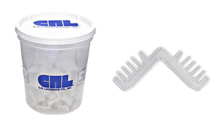 A plastic container of white nylon corner keys and a single V-shaped nylon corner key for 1/2 inch spacers.
