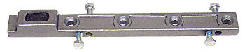 A metallic center-hung floor mounted closer arm featuring adjustment screws and mounting holes.