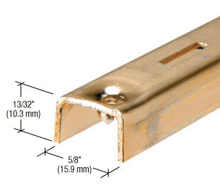 A close-up view of a brass-finished steel KV standard showing its U-shaped profile and mounting hole dimensions.