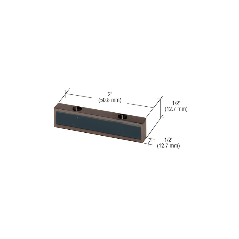 A technical diagram of a black bronze header mounted single door stop measuring 2 inches wide by 1/2 inch high and deep.