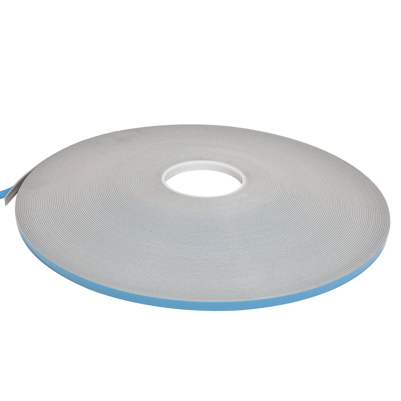 A single roll of gray double-sided foam glazing tape with a blue protective liner.