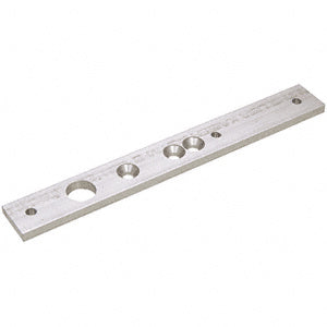 A flat, rectangular aluminum walking beam adaptor block featuring multiple pre-drilled mounting holes.