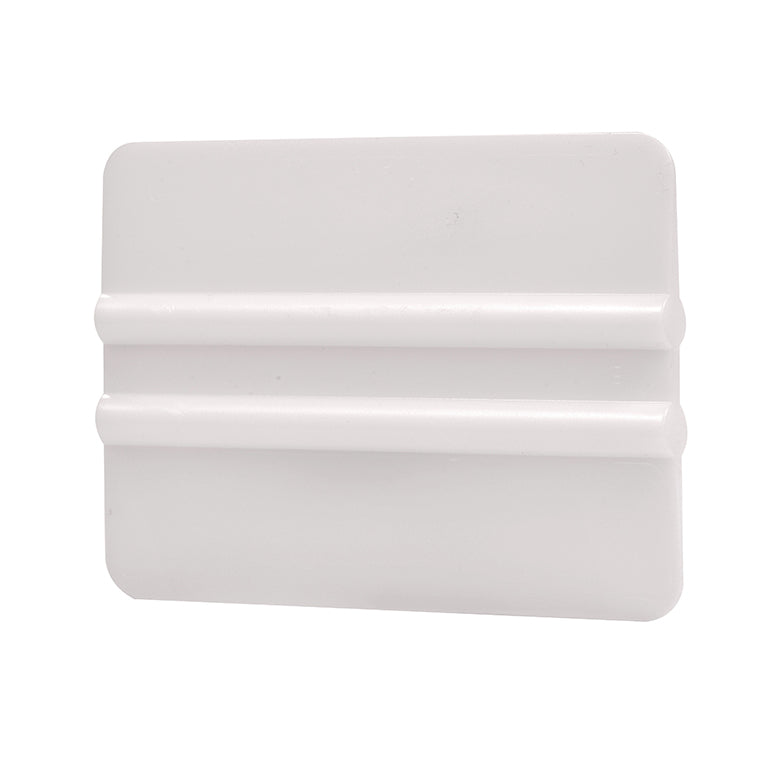 A white plastic double edge scraper tool shown from a front angle.