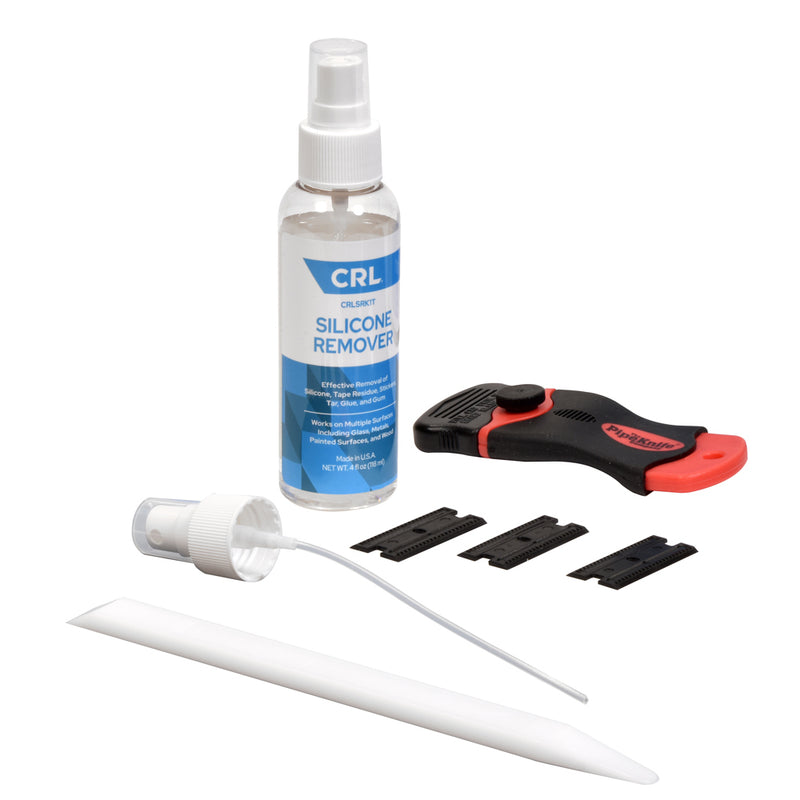The CRL Silicone and Adhesive Remover Kit includes an 8 oz. spray bottle, a handheld scraper tool, three plastic blades, and a white smoothing bone.