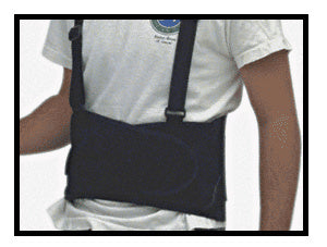 A person wearing a black elastic back support belt with shoulder straps over a white t-shirt.