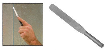 A hand uses a flat, flexible stainless steel spatula to work along a seam, shown alongside a standalone view of the 11-inch tool.