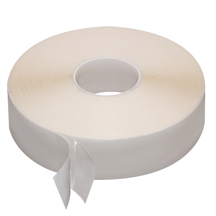 A single roll of translucent acrylic adhesive tape with a protective liner peeling away from the edge.