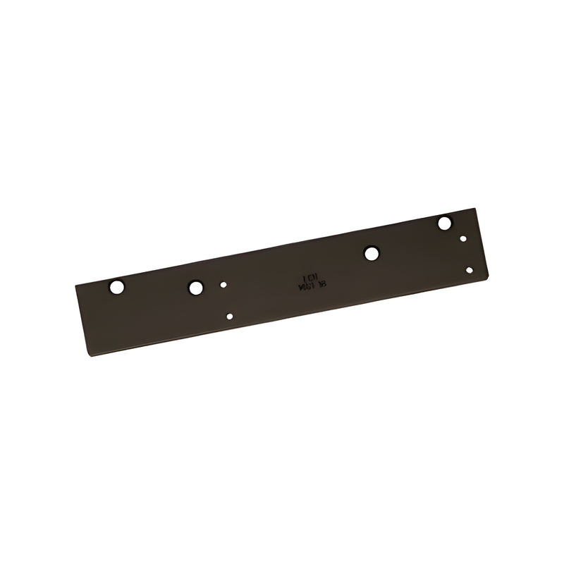 A rectangular dark bronze LCN drop plate for 1460 series surface mounted door closers with pre-drilled mounting holes.