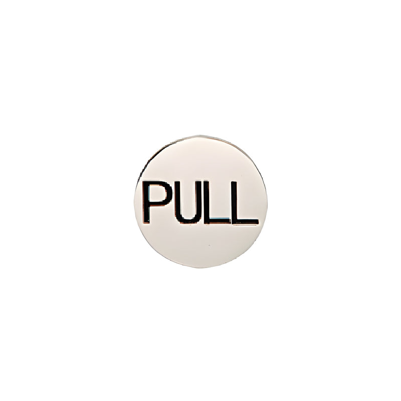 A circular polished stainless steel door indicator sign with the word PULL printed in black.