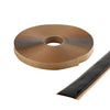 A roll of black Tremco 440 butyl architectural tape is shown with a strip of the adhesive tape extending outward.