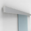 A close-up view of the satin anodized wall mount track for a sliding glass door system.