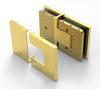 The Bellagio glass-to-glass hinge with its square cover plates removed to reveal the internal mounting hardware.