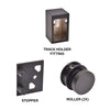 Labeled matte black Brixen shower door components showing a track holder fitting, a stopper, and two rollers.