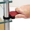 A hand uses the CRL adjustable strap wrench to grip a chrome cylindrical post.