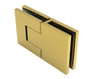 A close-up view of the assembled satin brass Bellagio hinge featuring a concealed square edge profile.