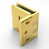 An angled view of the satin brass Bellagio hinge showing the offset back plate and mounting hardware.