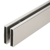 A detailed view of the brushed stainless steel header profile used in the Cambridge Series shower door system.