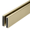 A detailed view of the brushed bronze stainless steel header track used for the Cambridge Series bypass shower door system.