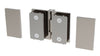 A Como Series glass-to-glass hinge with its decorative cover plates detached to reveal the mounting screws.