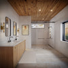 A wide-angle view of a contemporary bathroom showcasing the Brixen series sliding shower door installed in a niche.