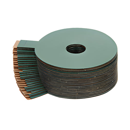 Stack of teal circular alignment seals with center hole, 25-pack for Clear Vac windshield repair kit (SKU CSTR6)