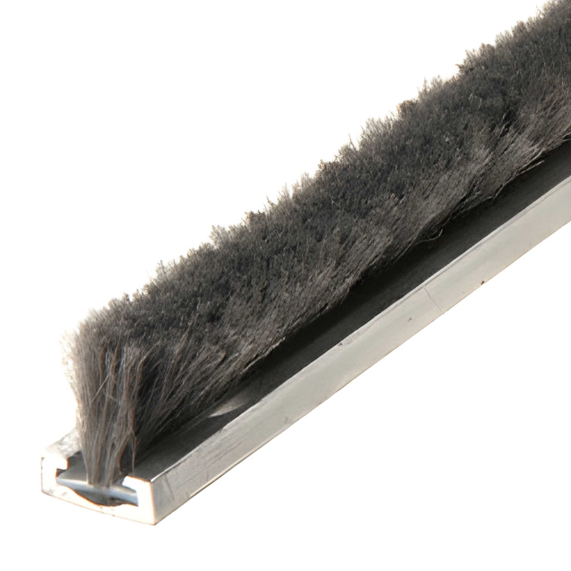 Mill-finish extruded aluminum base with 5/16" dark pile weatherstrip, low-profile door seal. SKU 30P5A96