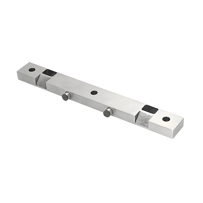 A brushed stainless steel door stop and strike plate designed for double door applications.