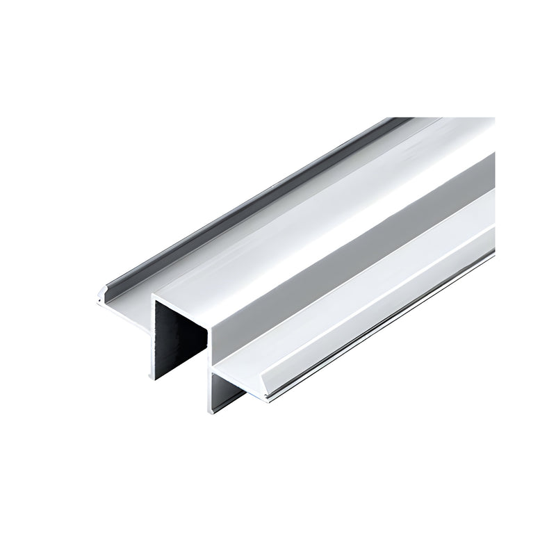 A close-up view of a silver metallic aluminum glass channel profile designed for wood top cap infill.