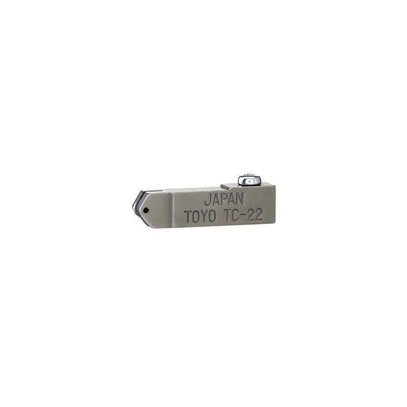 A grey metal Toyo TC-22 replacement head for a dry wheel glass cutter showing the cutting wheel and mounting screw.