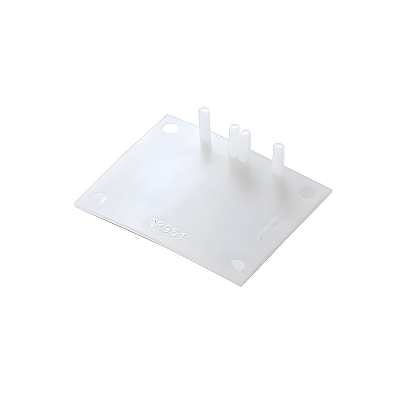 A white rectangular closure plate with mounting pins and holes, designed for 1-inch glazing structural silicone mullions.