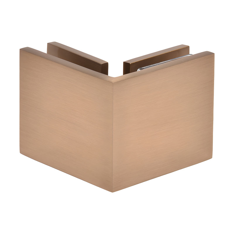 A close-up view of the exterior corner of a dark brushed bronze 90-degree glass-to-glass clamp.