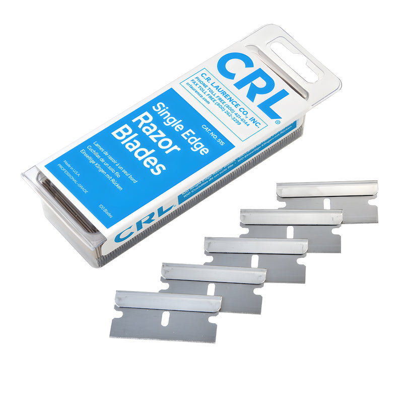A box of CRL single edge razor blades displayed with five loose surgical steel blades in front.