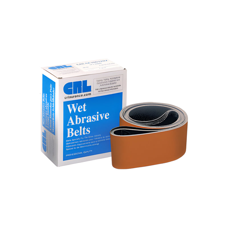 A box of CRL wet abrasive belts next to a coiled 4-inch by 106-inch cork polishing belt.