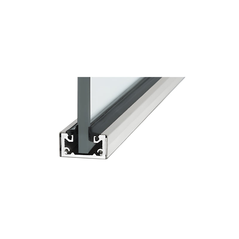 A close-up view of a brushed stainless steel shallow U-channel holding a glass panel with black rubber glazing gaskets.