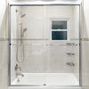 A fully installed sliding shower door kit with a brite anodized finish shown in a niche bathtub enclosure.