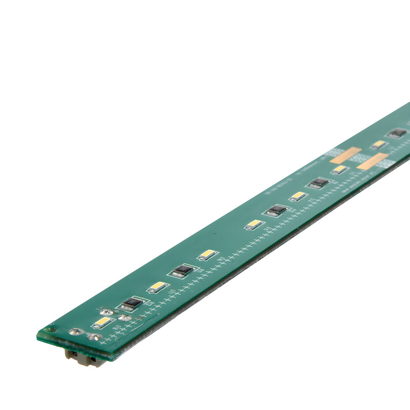 LED36CW 36-inch cool white low-voltage LED strip light on green PCB with surface-mount LEDs and solder pads.