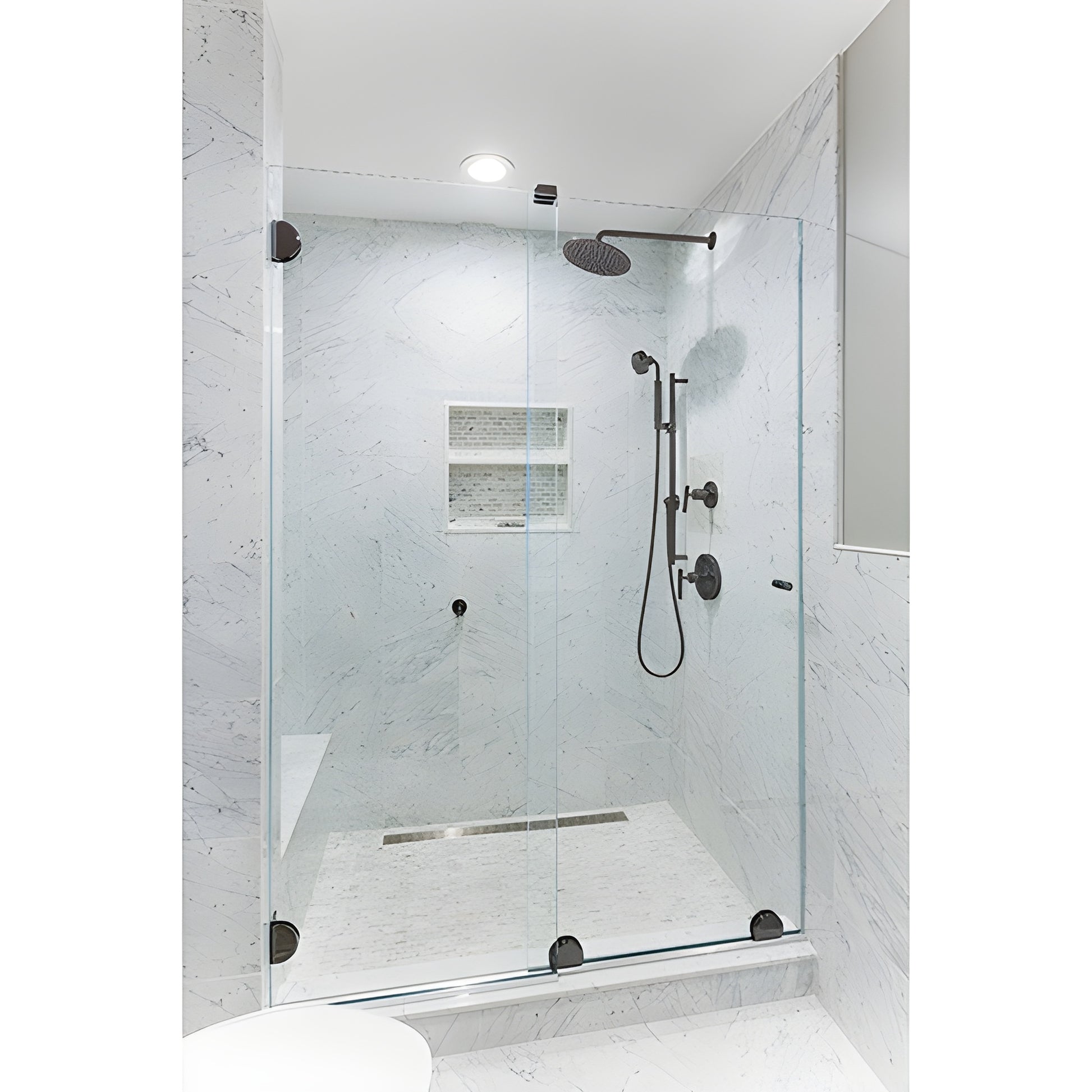 ESS10RB frameless sliding shower door kit with oil-rubbed bronze bottom rollers on clear glass in marble shower.