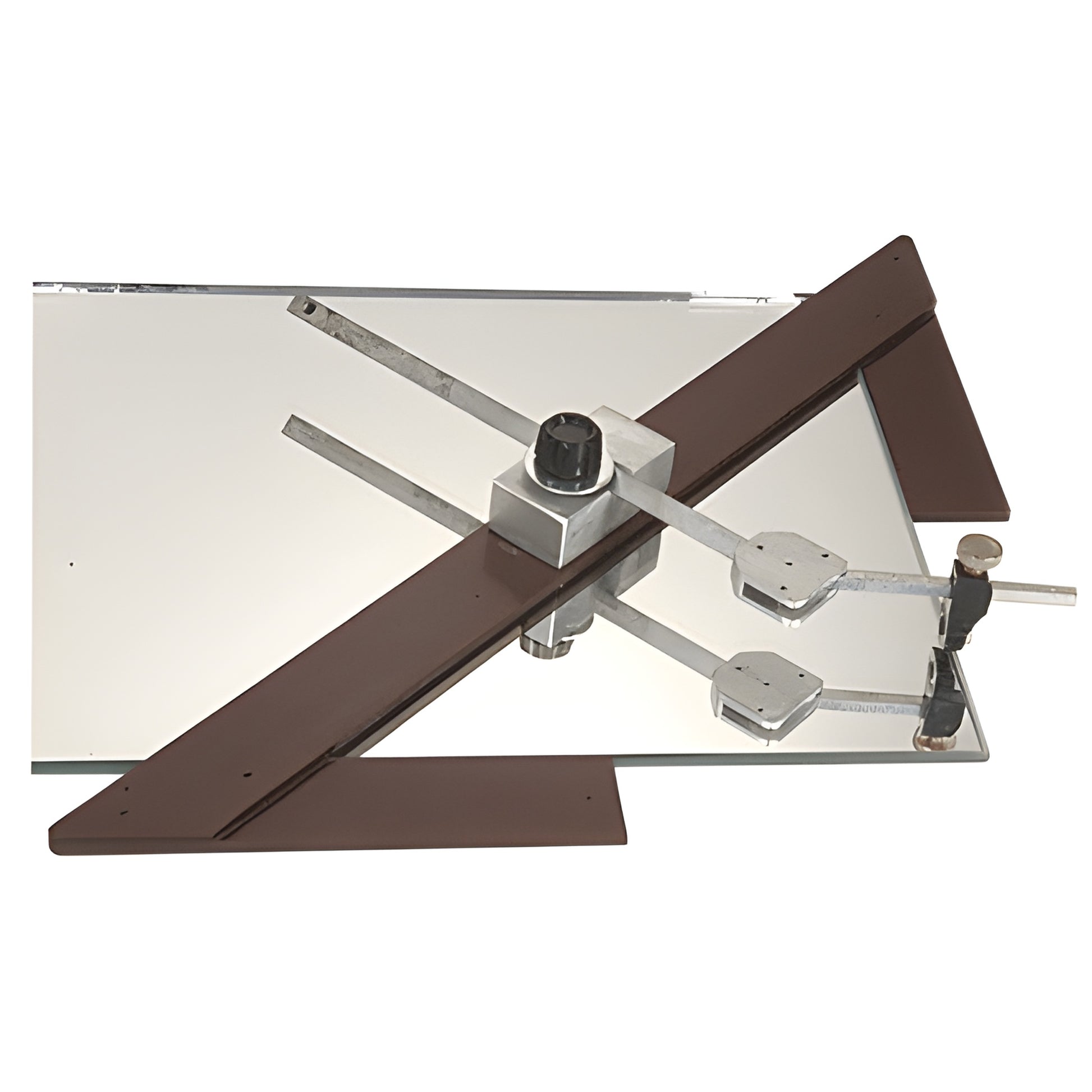 CR09 corner radius cutter on mirror: adjustable metal tool with cutting turret and brown corner guides for rounding glass