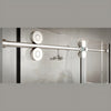 Close-up view of the top-mounted rollers and stainless steel track for the Crescent Series sliding shower system.