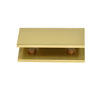 A close-up view of the polished brass fixed panel glass clamp showing the interior adjustment screws.