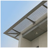 A close-up view of the structural support brackets and perforated metal mesh of the CRL Custom 7750 Series sunshade.