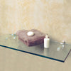 Two white shelf brackets supporting a glass shelf holding a towel and bottle.